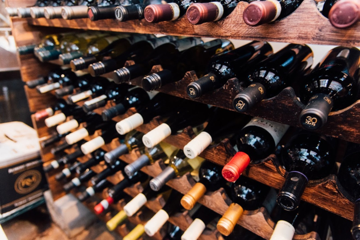 Rack with bottles of wine